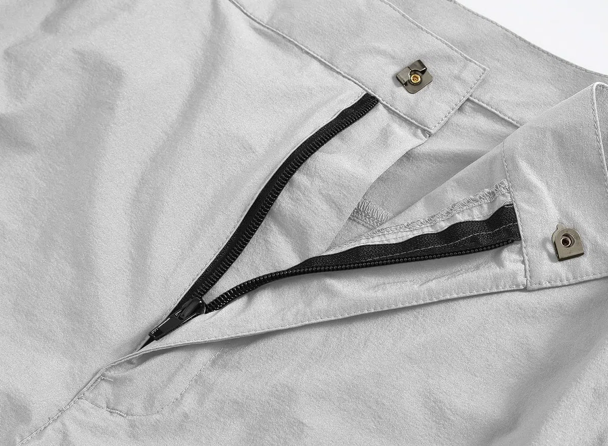 YSENTO Pantalones de senderismo para mujer, impermeables, de secado rápido, elásticos, con bolsillos con cremallera