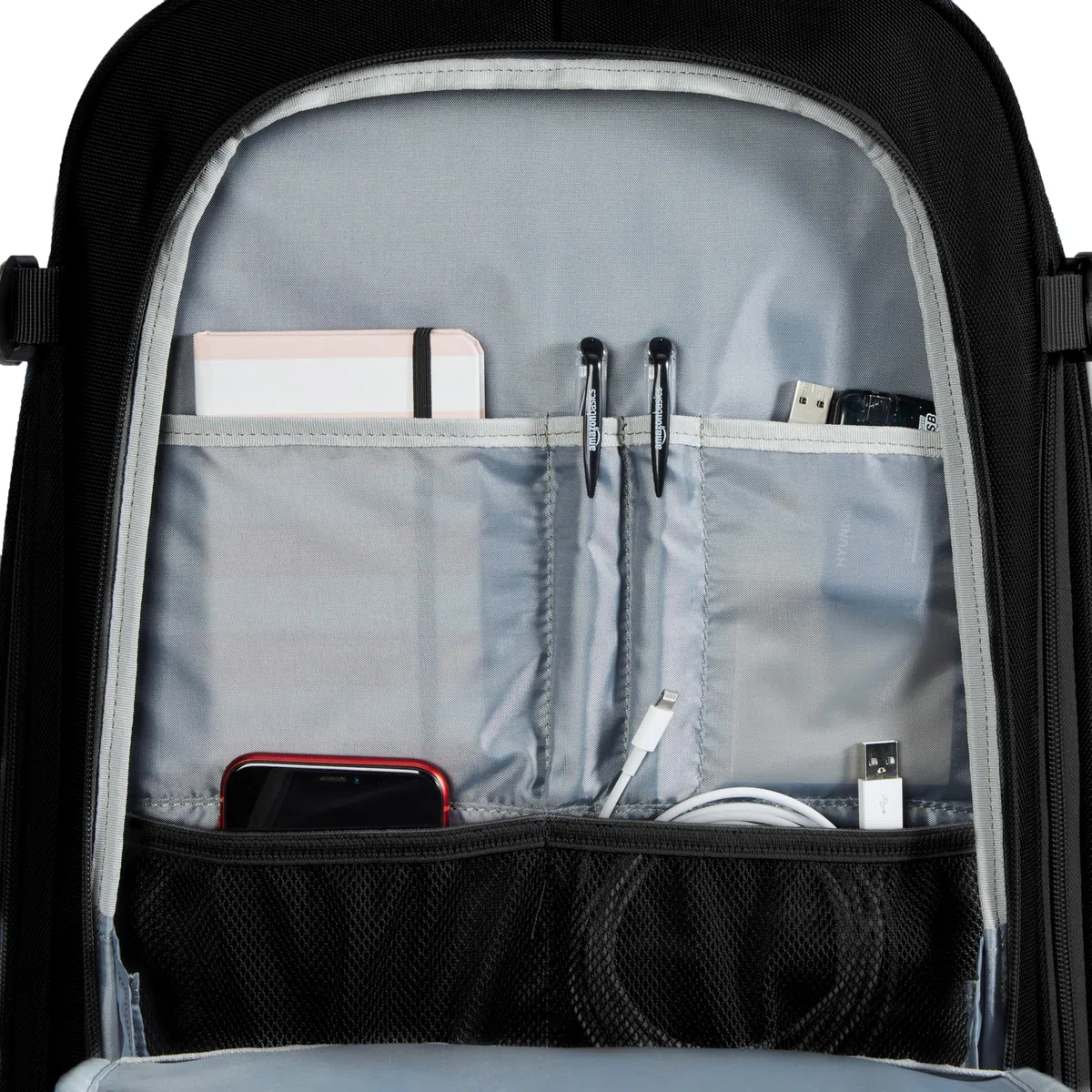 Amazon Basics Mochila de Viaje 40L, Equipaje de Mano (51x38x20cm), Tirantes Acolchados, Compartimento Portátil 17", Bolsillos Organizados - Negro